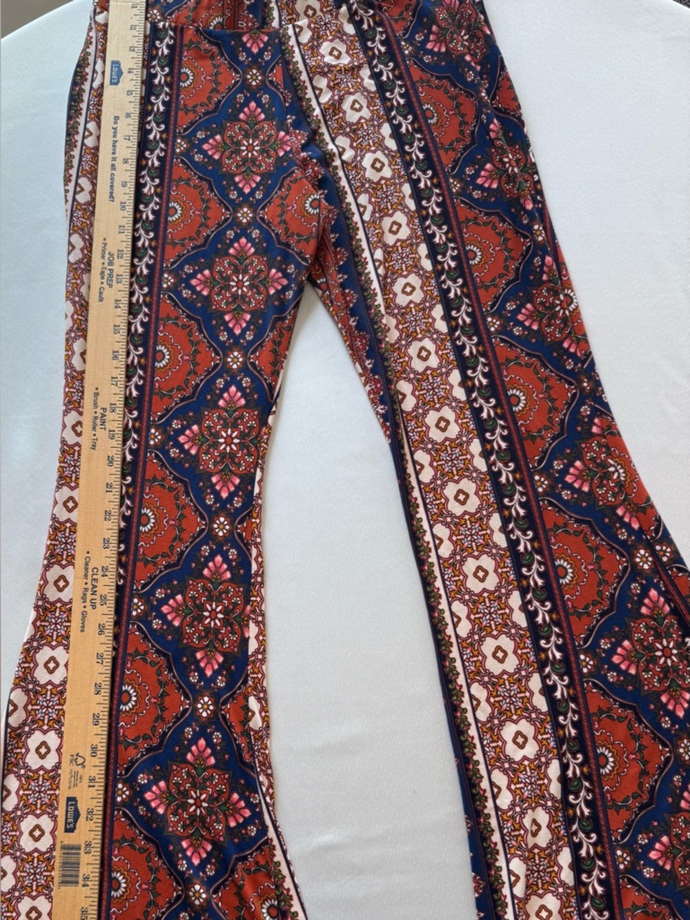 Altar’d State Boho Floral Print Flared Pants in Rust & Navy